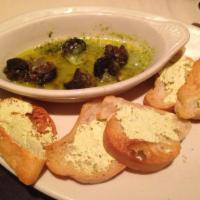 Escargot · Served in garlic and butter reduction sauce.