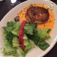 Crab Cakes · Roasted red bell pepper cream sauce.