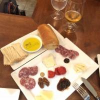 Artisan Cheese and Charcuterie Plate · Featured We Olive EVOO, bread, crackers, artisan spreads, We Olive mustard, and accouterment...