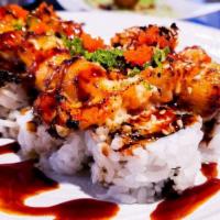 Lobster Roll · Mini lobster and crab meat roll topped with baked mini lobster mixed with dynamite sauce, ma...