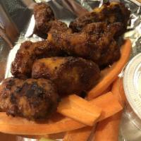 Boneless Wings · Choice of spicy Buffalo, hot Thai, sweet BBQ or original. Served with ranch, blue cheese or ...