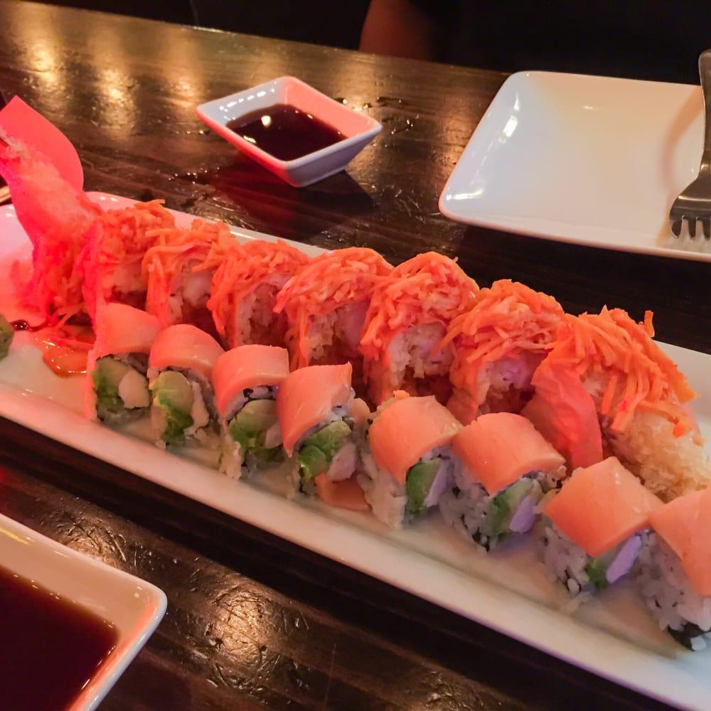 Angry Dragon Roll · Crispy shrimp tempura, spicy tuna and papaya inside, topped with spicy crab and sweet citrus sauce.
