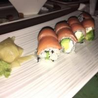 Philadelphia Roll · Avocado and cream cheese inside, topped with smoked salmon.