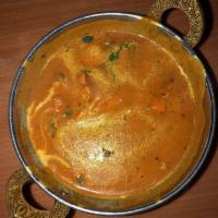 Chicken Tikka Masala · Tandoori cooked chicken breast sauteed in a tomato sauce.