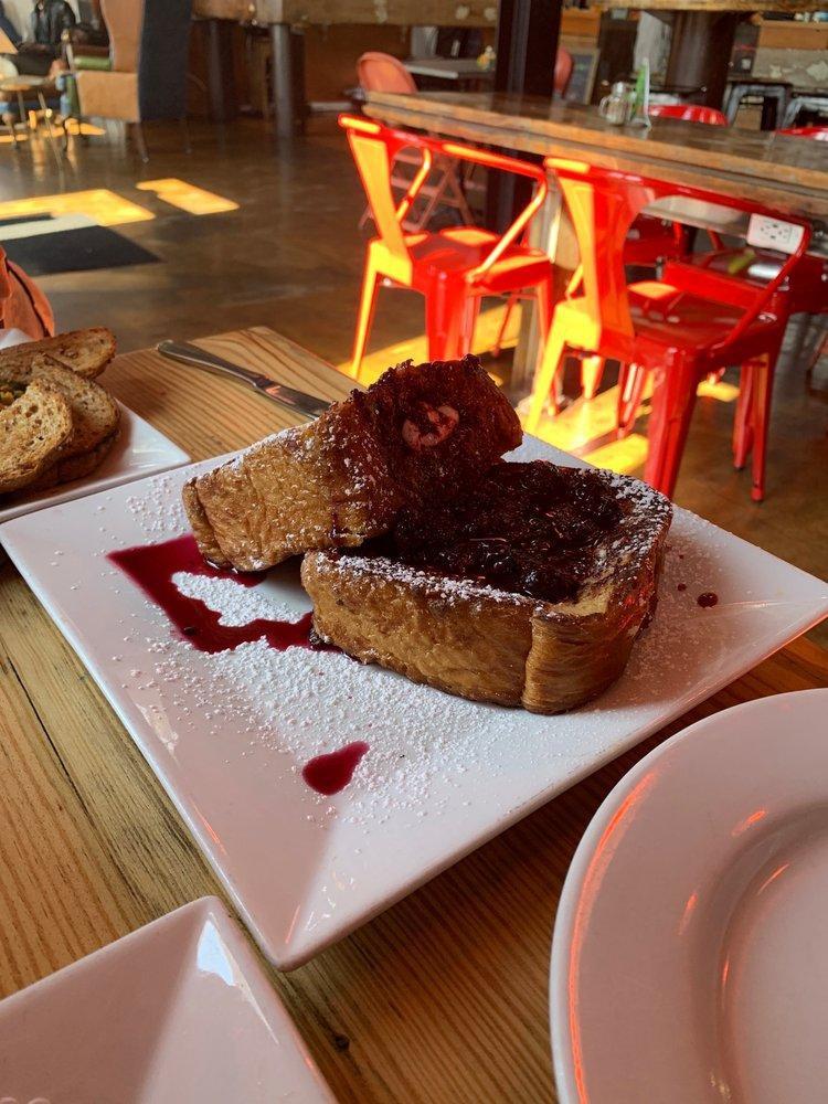 Stuffed French Toast · 2 thick brioche slices stuffed with orange scented mascarpone and berry compote.
