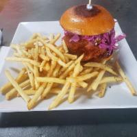 Buffalo Chicken Sandwich · Crispy chicken thigh tossed in our housemade piri pa buffalo sauce topped with blue cheese s...