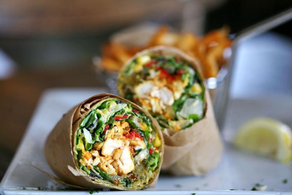 BBQ Chicken Wrap · White meat. Wrapped with lettuce, corn, black beans, tomatoes, scallions, tortilla strips and Monterey Jack cheese with herb ranch and BBQ sauce. Choice of wheat tortilla, spinach tortilla or lavash bread.