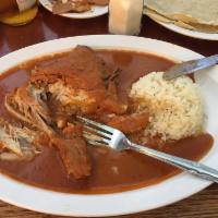 Mole Rojo · Your choice of chicken breast or chicken leg covered with Oaxaca's famous red mole made from...
