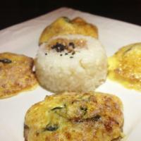 Sunny Side Shiitake · Fresh shiitake mushrooms with spinach and torched garlic yolk sauce.  