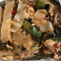 Drunken Noodles · Stir fried flat noodles with spicy chili, basil, broccoli, bell pepper, cabbage, onion, and ...