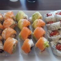 Plano Roll · California roll topped with shrimp and salmon.