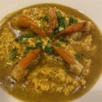 Curry Shrimp · 5 jumbo shrimp marinated in curry sauce.
