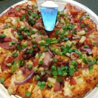 Maui Zaui Pizza · Ham with bacon, pineapple, tomatoes, red and green onions on Polynesian sauce.