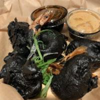 Black Garlic Shrimp · Roasted black garlic, squid ink, spicy aoli & crispy garlic ponzu sauce