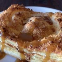 Apple Pie · Carmelized apples and cinnamon inside flakey puff pastry, topped with toasted almonds, drizz...