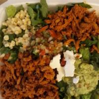 Fiesta Bowl · Select choice of meat. 

Bean and rice base with romaine lettuce, guacamole, pico de gallo, ...