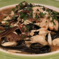 Black Squid Ink Fettuccine Pasta · Served with Jumbo Lump Crab meat, mixed mushrooms shiitake and porcine in a delicious withe ...