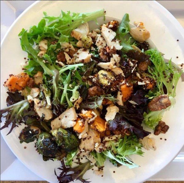 Farmhouse Salad · 270 calories. Chopped kale, spring mix, roasted turkey, roasted butternut squash, roasted brussels sprouts, honey roasted pecans, and feta cheese. Recommended dressing: apple cider vinaigrette. Dressing served on the side only.