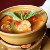 Red Curry · Red curry paste with bamboo shoots, basil, zucchini and bell pepper in coconut milk. Served ...
