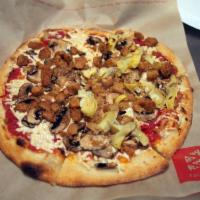 Berkeley Vegan Pizza · Housemade marinara sauce, daya vegan cheese, beyond metal vegan sausage, roasted zucchini ba...