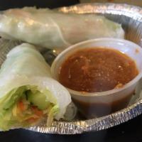 Fresh Spring Rolls · Fresh spring rolls with rice noodles, tofu, carrots, cucumbers, and lettuce. Served with hom...