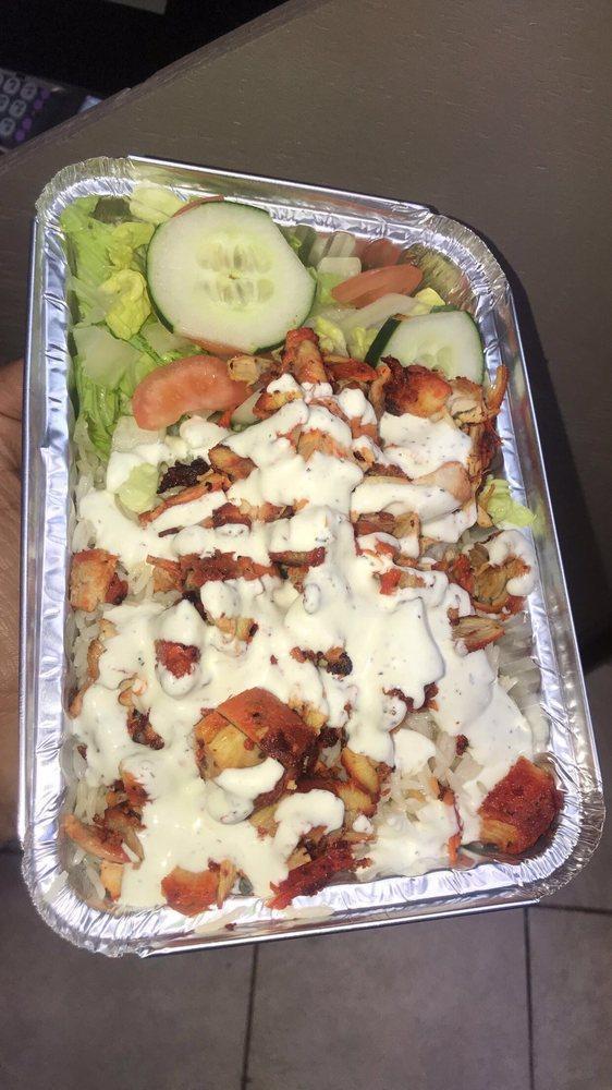 Combo Chicken and Lamb Gyro Bowl with Rice and Salad · Made with fresh homemade sauce and fresh marinated meat, comes with Basmati rice lettuce tomato , cucumber and onion.