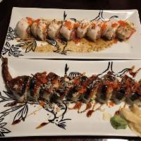 Little Tokyo Roll · Spicy tuna, avocado, topped with torched seared white tuna drizzled with pistachio aioli and...