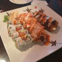 Crunchy Roll · Salmon, crabmeat and cream cheese topped eel sauce and wasabi sauce.