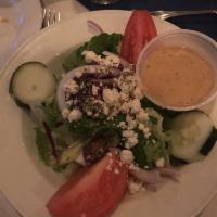 Greek Salad · Lettuce, tomatoes, cucumbers, onions, bell peppers, feta cheese, anchovies and Kalamata oliv...