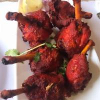 Chicken Lollipop · Chicken wings made to the shape of lollipop, marinated and deep fried.