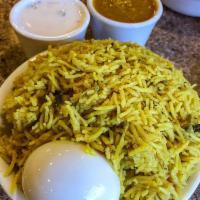Special Chicken Biryani · Basmati rice cooked with chef's special exotic spices and condiment.