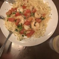 Shrimp Spumoni · Tender select shrimp lightly sauteed in white wine and garlic butter sauce with fresh diced ...