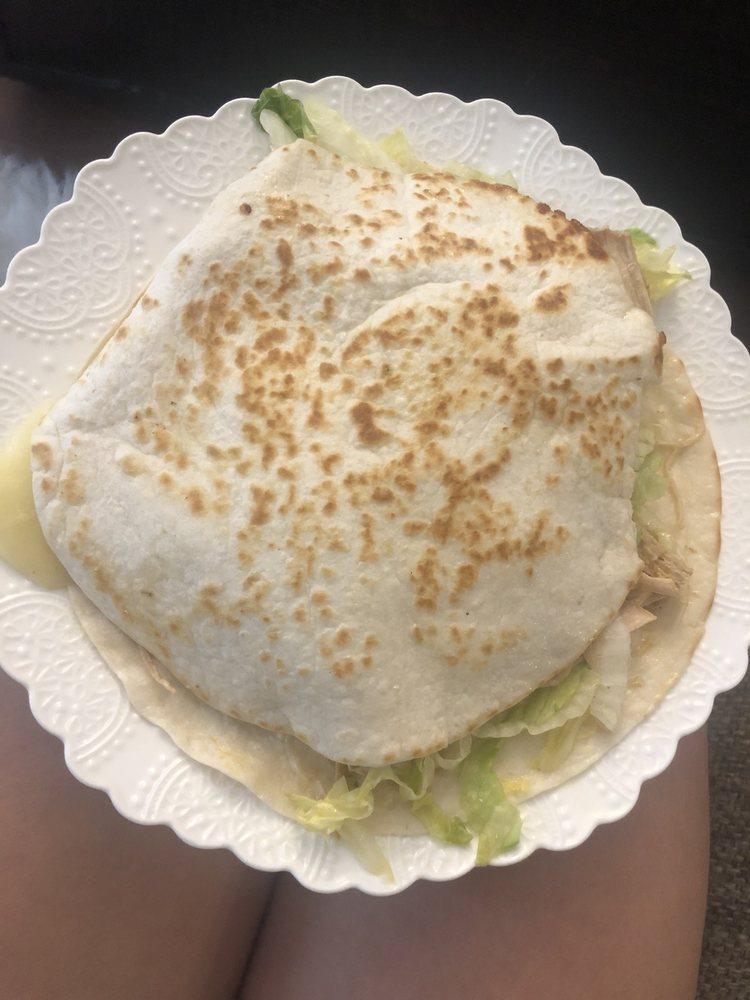 Super Quesadilla · Meat, melted cheese, guacamole, sour cream, lettuce, and salsa.