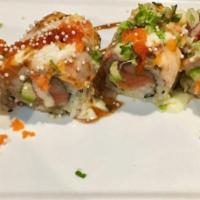 Spectrum Roll · Tuna, salmon, yellowtail and avocado inside with tuna and salmon outside. Lightly torched wi...