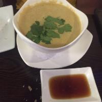 Coconut Curry Soup · Shrimp, red onion, cilantro and rice noodle.