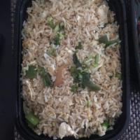 Basil Fried Rice · Stir fried rice with your choice of meat, onion, carrot, green bean, green peas, egg and fre...