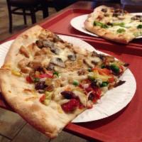 Vegetable Pizza · Mushrooms, peppers, onions, broccoli, fresh tomato and spinach.