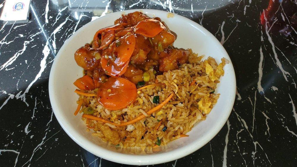 Mandarin Orange Chicken · Our famous orange sauce, garlic, ginger, scallions, crushed red peppers, carrots and chili oil.