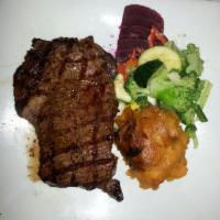 12 Oz. Grilled Black Angus New York Strip · 