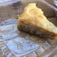 Baklava · Rich, sweet dessert pastry made of layers of filo filled with chopped nuts and sweetened and...
