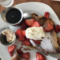 French Toast · 4 triangles of French toast topped with our Marionberry preserve and sweet cream with a side...