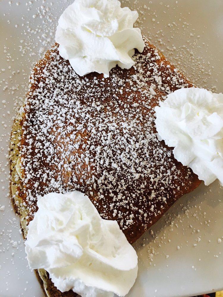 The Classic Crepe · Nutella, strawberries, bananas, whipped cream.
