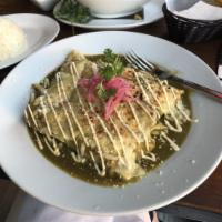 Enchiladas Verdes · Soft Corn Tortillas, Green Tomatillo Sauce, Melted Cheese, Cream, Rice on the side, Choice o...