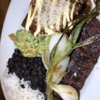 Carne Asada Tampiquena · Tequila Marinated Skirt Steak, Grilled Onions, Guacamole, Mole Enchilada, White Rice, Black ...