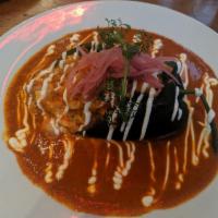 Chile Relleno · Roasted Poblano Pepper in a Tomato Broth, Cream, filled with Cheese, Rice and Tortilla on th...