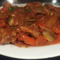 Chicken Cacciatore · Chicken on the bone with peppers, onions, and mushrooms in a light marinara sauce. Served wi...