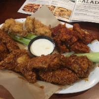 Boneless Wings · Hand-breaded boneless wings served with your favorite Hooters wing sauce. And no bones, so t...
