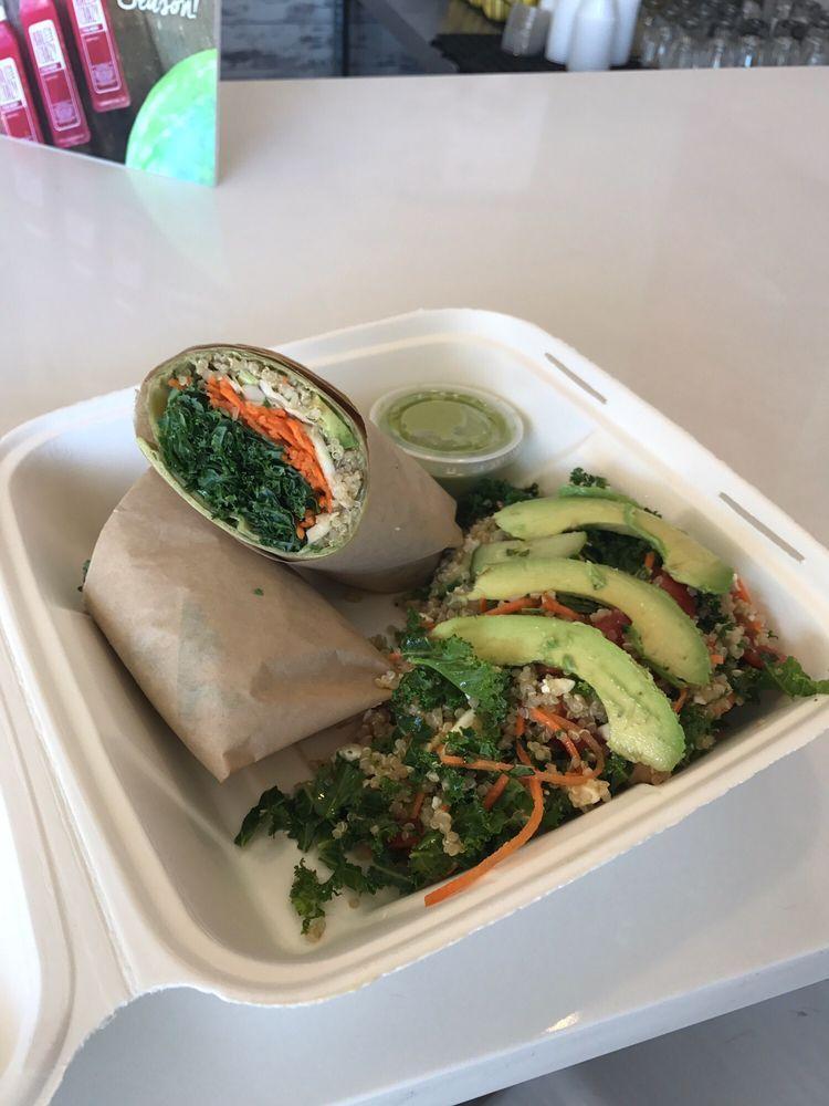 Vegan Wrap · Kale, quinoa, cabbage, carrots, pickled red onion, avocado and hummus wrapped in a spinach tortilla and served with tahini