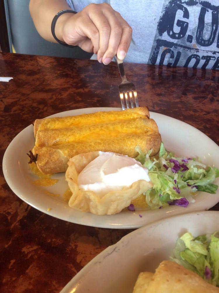 Flautas · 3 rolled tacos topped with melted cheese. Add guacamole or sour cream for an additional charge.
