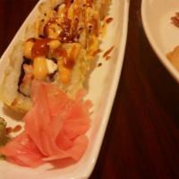 Tiger Roll · 10 pieces whole roll deep fried cut. Smoked salmon, avocado, cream cheese, shrimp, crab and ...